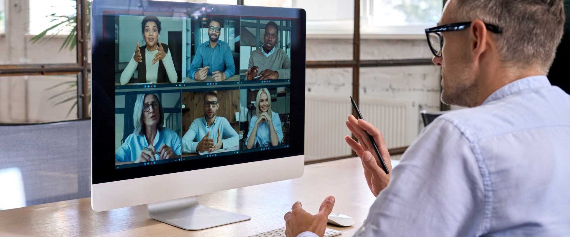 Corporate leader manager leading videoconference with diverse team business people having digital group video call conference working in office at online virtual meeting on pc computer. Over shoulder SSUCv3H4sIAAAAAAAACpyRwW7DIAyG75P2DhHnRmqSJm32KtUODjgNKoUKSKep6rvPQKg474Y/27/9m+fnR1WxCZzk7Kt6hohiqdTqvAUvjSa8323cohZoS/Kw3bAvAQrpjZWgSjiB54uGGxLUq1IBv2KSOQ9+dejC9A1x8HghjQTfEmnFc4qrnIhJ6qAUY7uCuXWKLKMk/q/O9PjObuCCmv/GhQsjFhVCMnJOpez649HeSmuwCmkKVw/DQYWCrlC6W8mlvhRtxi/x7LmNm1V7G1Z4b86UMXeYVDjxTJqY+QLOUbnIvBjE6ZPNrZijjY8GNlUm6CdC2HTtad81p2PbN8Mwdod+K0i/t0jSietkIYr5VYrSugwbsKOYhBg41ji3TX3o27Ee8dTUHKe+BzGMYm7p8K8/AAAA//8DAEgQLq2YAgAA